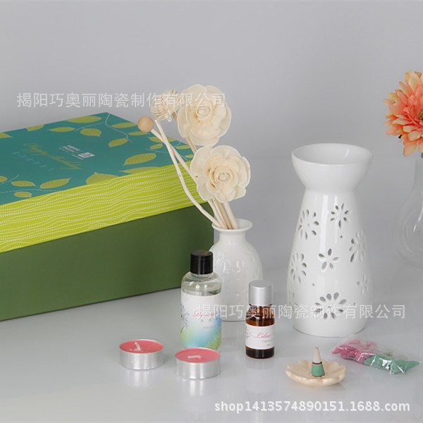 新款創(chuàng)意收工鏤空陶瓷擺飾品 經(jīng)典迷你插花瓶 精油瓶送禮禮盒批發(fā)