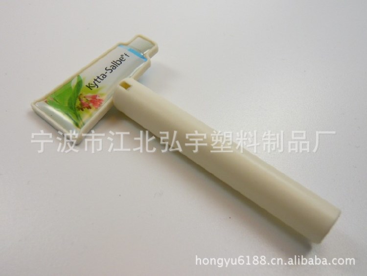 廠家供應塑料牙膏器 斧頭牙膏擠壓器 歐美洗漱用具 環保材料定制