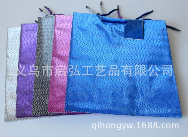 廠家供應(yīng)金蔥手提紙袋 品牌服裝牛皮紙手提袋 禮品袋 購物紙袋