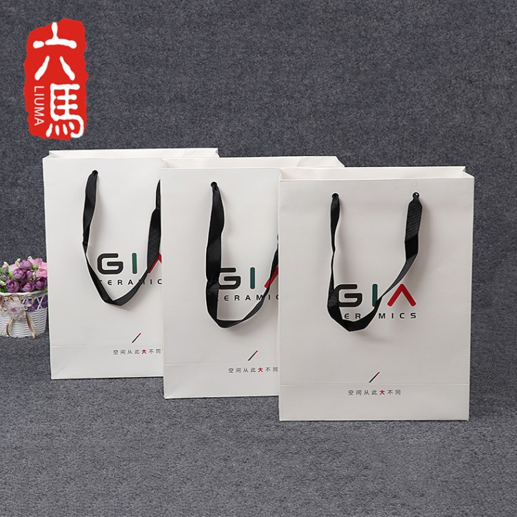 廠家批發(fā) 化妝店商場(chǎng)通用手提購(gòu)物袋 白卡紙禮品包裝紙袋 定做