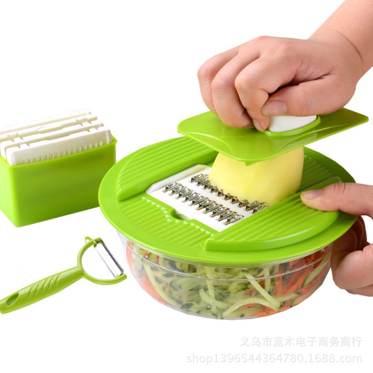新款圓形手拉式切菜器 多功能帶護(hù)手擦絲器廠家直銷(xiāo)中
