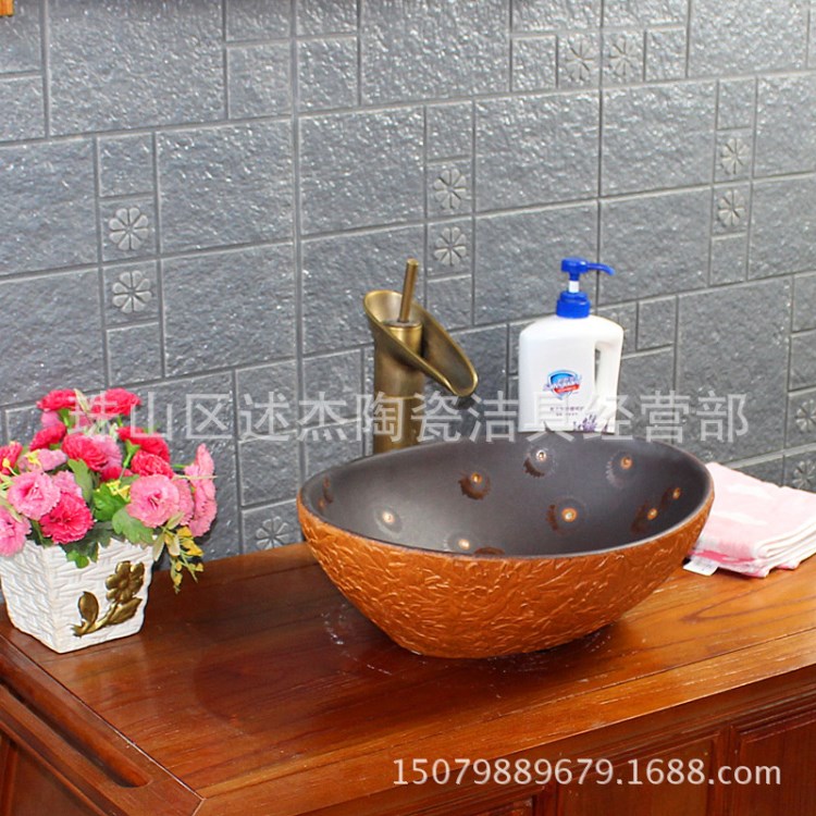 【廠家直銷】景德鎮(zhèn)陶瓷藝術(shù)臺上洗臉盆述杰衛(wèi)浴元寶型特色洗手盆