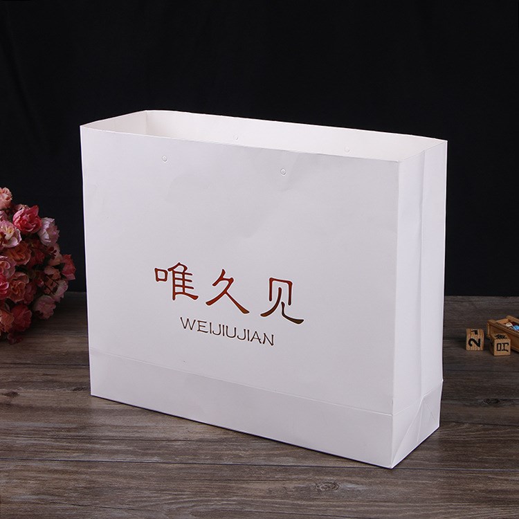 手提服裝購物紙袋定做 彩印白卡紙袋定制logo 創(chuàng)意廣告禮品袋制作