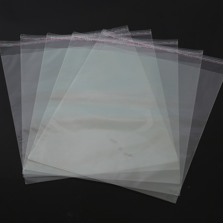 跑量現(xiàn)貨廠家直銷OPP透明自粘袋塑料包裝袋不干膠封口袋量大從優(yōu)