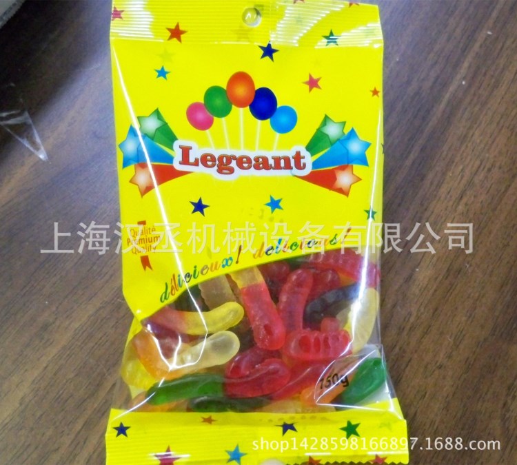供應(yīng)QQ糖包裝機(jī) 小袋軟糖打孔包裝機(jī) 旺旺小饅頭顆粒包裝機(jī)