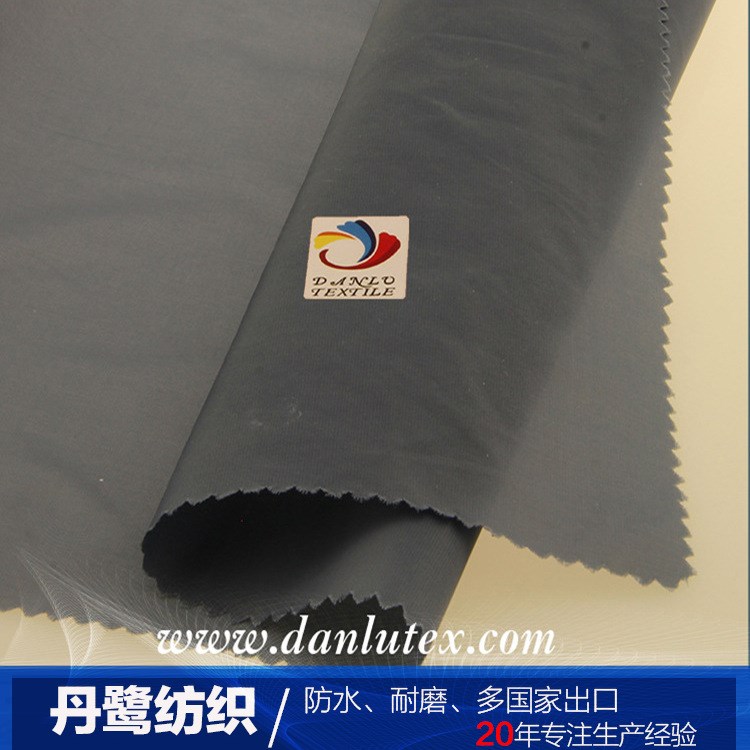 廠家直銷滌綸180T滌塔夫  箱包面料 批發(fā)