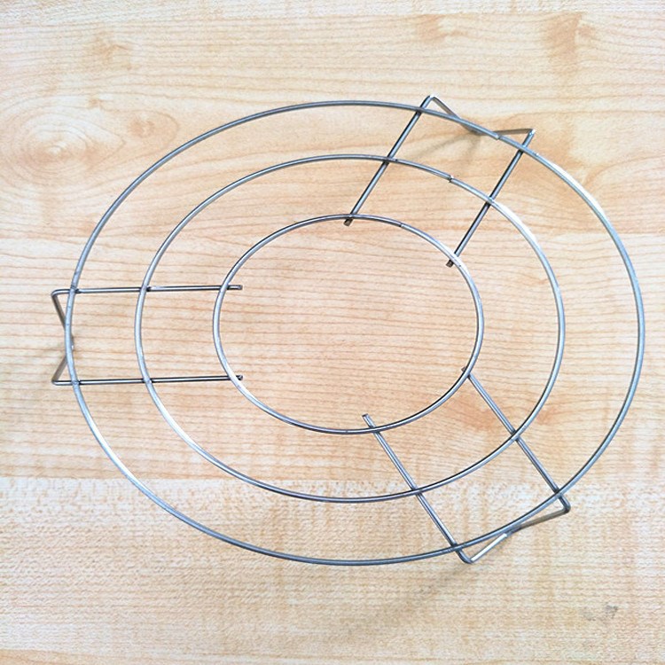 供應(yīng)不銹鋼蒸架不銹鋼三角蒸架廚房小工具2元店必備產(chǎn)品廠家批發(fā)