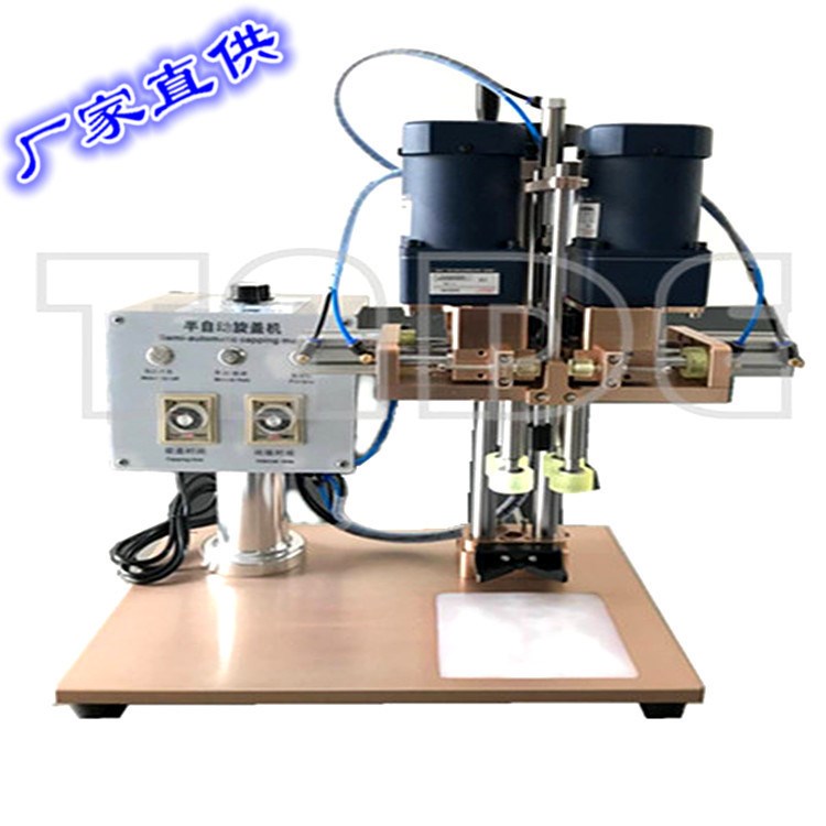 廠家生產(chǎn)批發(fā)直銷玻璃水瓶半自動旋蓋機鎖蓋機擰蓋機氣動四輪擰蓋