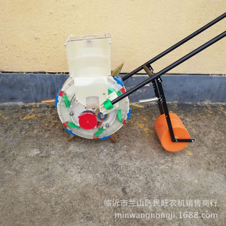 現貨批發多功能手推式播種機玉米大豆花生滾輪點播機新款播種機