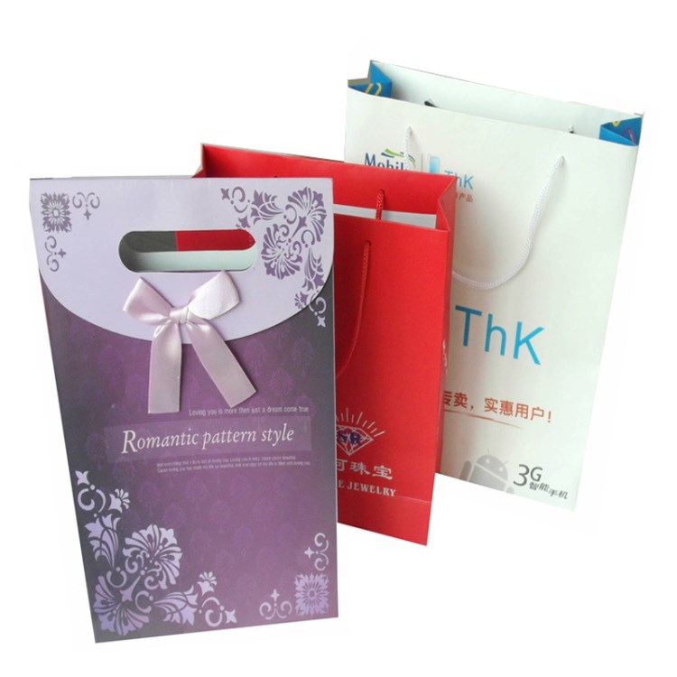 廠家現(xiàn)定做服裝手提袋 牛皮紙質(zhì)日用品手提袋子酒類禮盒袋檔案袋
