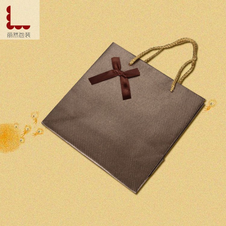 廣州工廠來(lái)樣來(lái)圖定做印刷特種紙包裝袋廣告珠寶紅酒化妝品手提袋