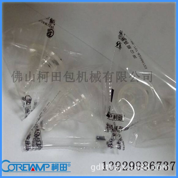 散裝糖果專(zhuān)用立式包裝機(jī)，m&amp;m巧克力定量包裝機(jī)，青島立式包裝機(jī)