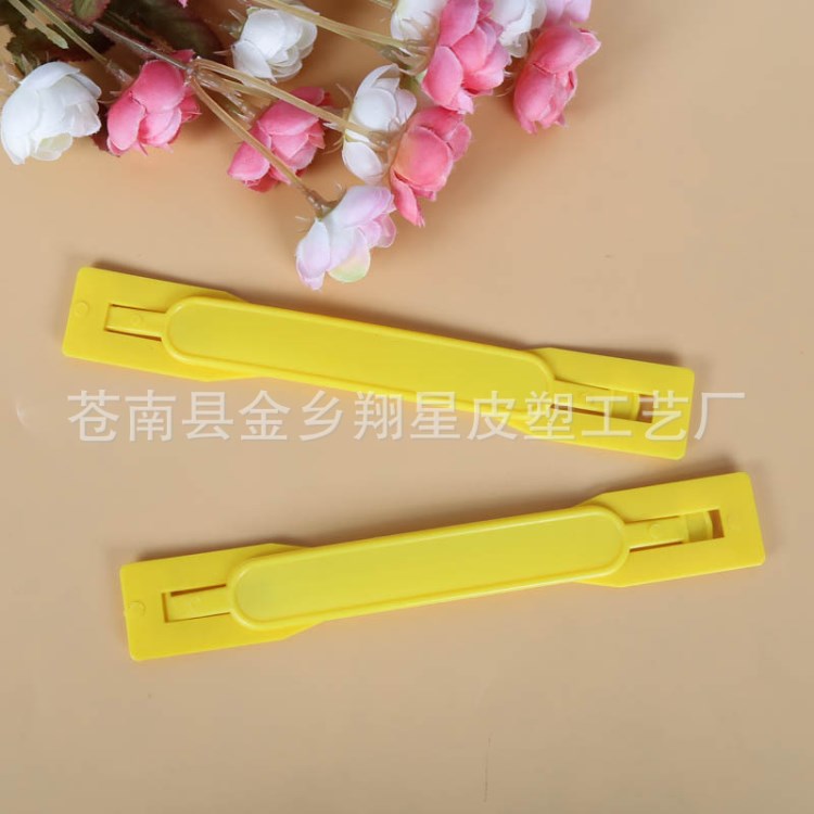 廠家生產(chǎn)創(chuàng)意環(huán)保塑料提手 快遞紙箱扣  禮品包裝手把手提批發(fā)
