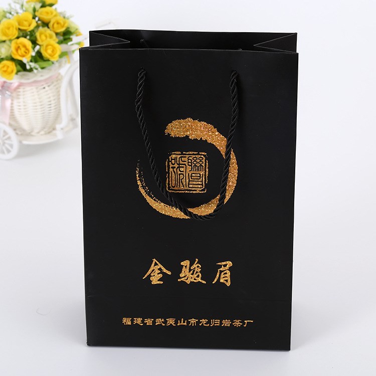 金獅廠家提供創(chuàng)意服裝購物手提紙袋質(zhì)優(yōu)價平卡通白卡紙紙袋