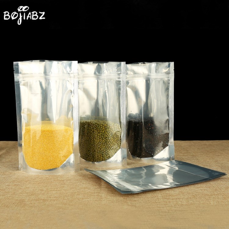 廠家直銷陰陽鋁箔自立自封袋食品級半透明鋁箔真空包裝袋鋁膜定做
