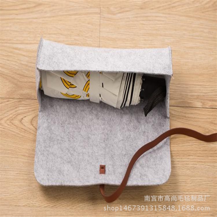 直銷(xiāo)毛氈雨傘袋吸水毛氈雨傘套無(wú)紡布袋時(shí)尚新穎雨傘收納袋飾品