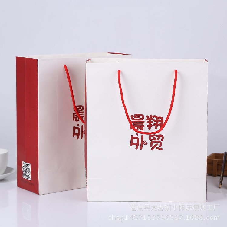 廠家直銷環保服裝購物手提袋定制 白卡紙禮品袋定做logo