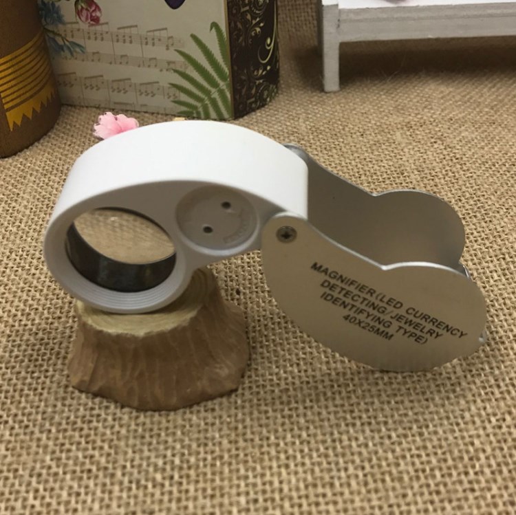 晶輝廠家直銷 40x25MM高倍珠寶鑒定放大鏡紫光白光21016