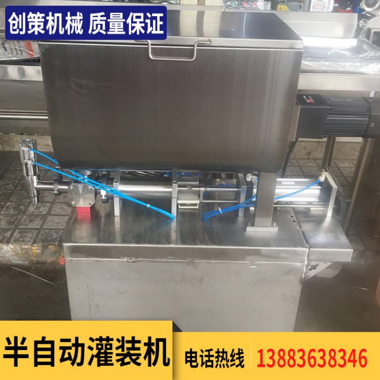 廠家直銷辣椒醬半自動(dòng)氣動(dòng)定量灌裝機(jī) 臥式攪拌花生醬定量灌裝機(jī)