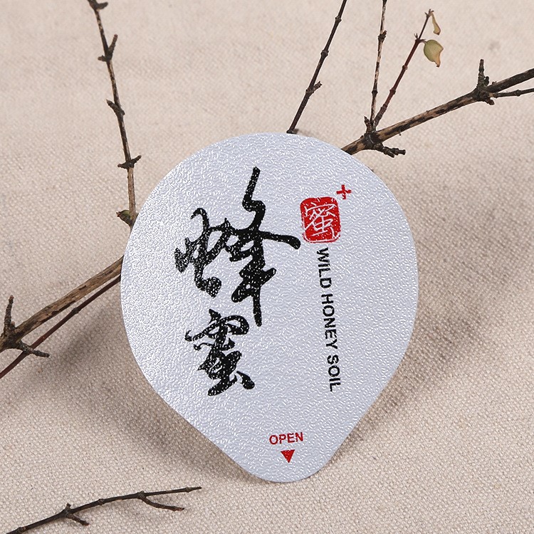 厂家定制蜂蜜PP杯封口膜 果冻封口膜 铝箔压花易撕膜LOGO定制