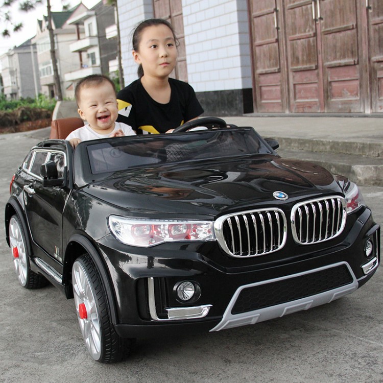 新款雙座兒童電動(dòng)車超大越野車四輪雙驅(qū)雙電搖擺可坐遙控玩具童車