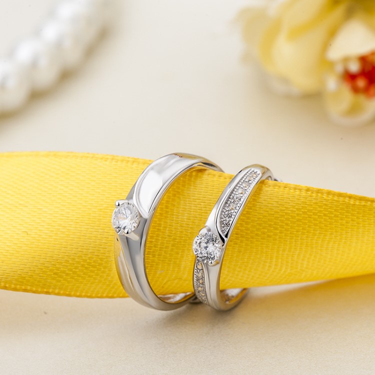 麗銘銀飾 s925韓版風(fēng)情侶戒指 唯美銀曲線鑲鉆男女對戒廠家直銷