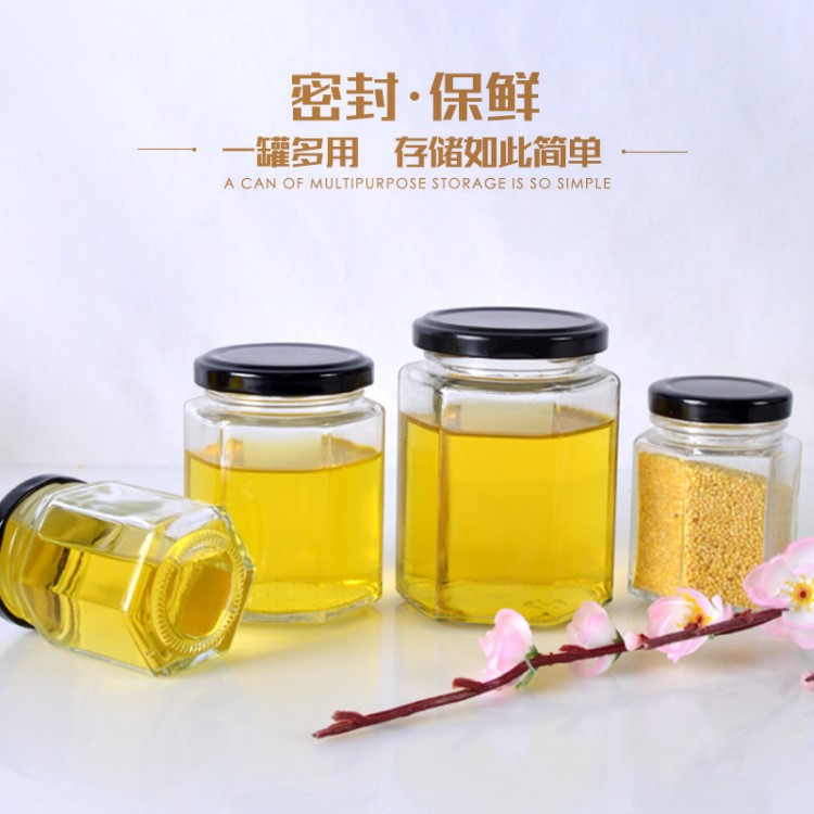 現(xiàn)貨供應(yīng)180ml500毫升蜂蜜瓶六棱玻璃瓶醬菜瓶果醬瓶含蓋規(guī)格定制