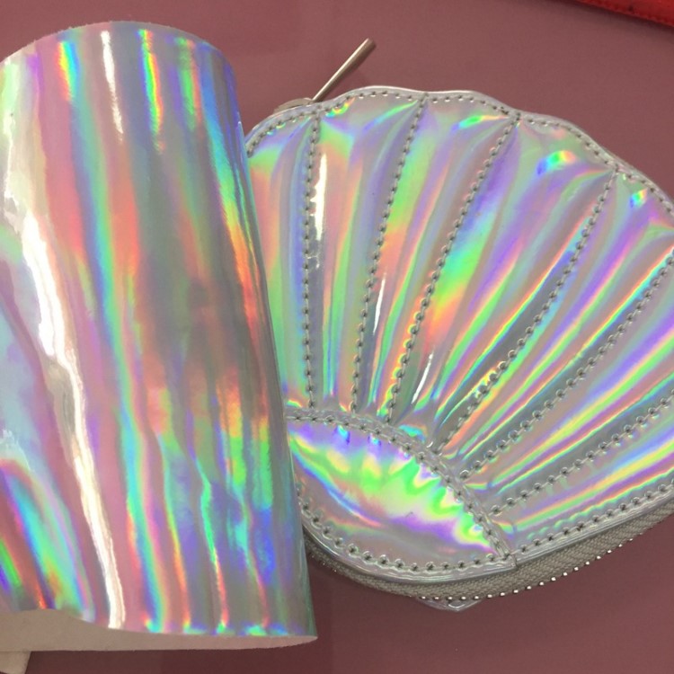 鐳射幻彩鏡面PU皮革鞋材箱包背包亮面特殊仿皮防水人造革面料