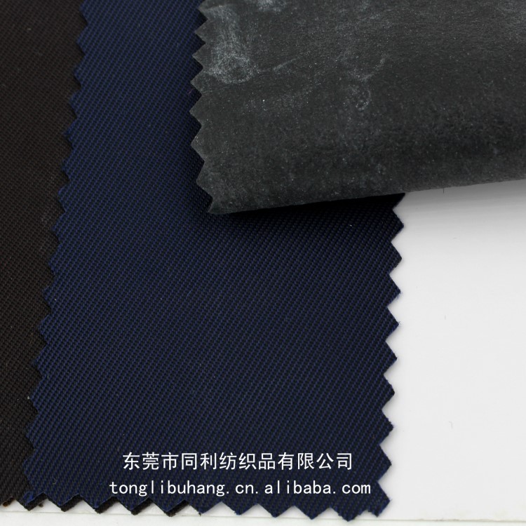尼龍230T斜紋雙色水松底發(fā)泡面料尼龍水松亂紋發(fā)泡面料現(xiàn)貨供應(yīng)