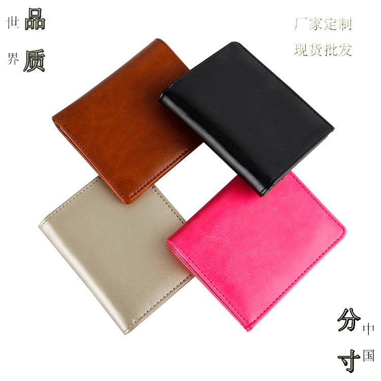 源頭廠家新款PU通用短款錢包商務(wù)休閑手拿包工廠現(xiàn)貨零售爆款錢夾