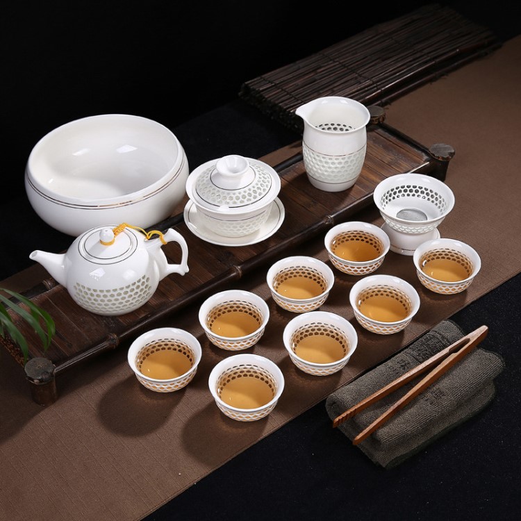 廠家青花瓷玲瓏功夫茶具套裝蜂窩巢鏤空陶瓷茶杯茶海蓋碗整套批發(fā)