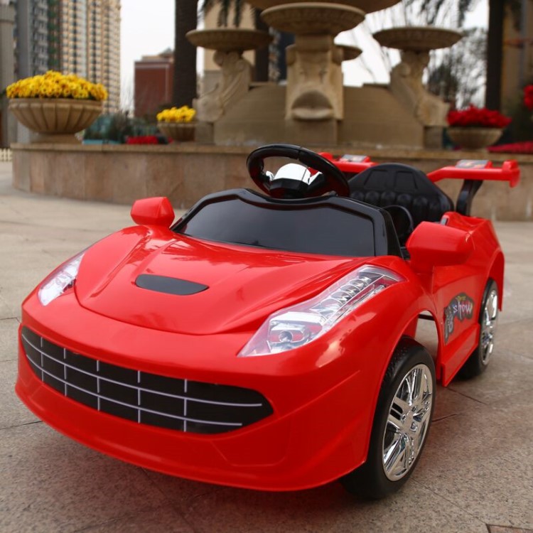 批發(fā)兒童電動汽車 雙驅(qū)遙控 緩啟動音樂四輪電動童車自行車批發(fā)