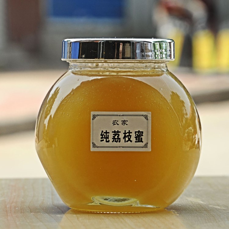 天然蜂場(chǎng)新采成熟荔枝龍眼雪脂蓮蘋果五味子蜂蜜500g淘寶微商代發(fā)