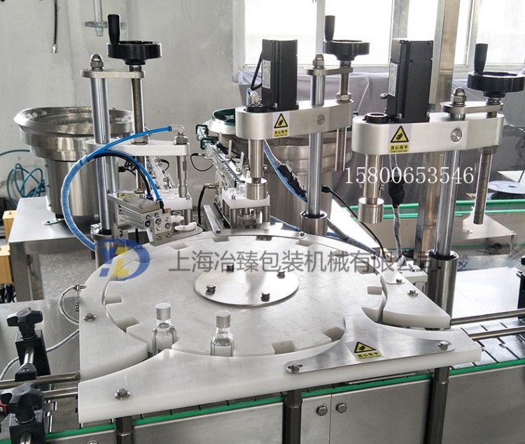全自動(dòng)灌裝上蓋旋蓋機(jī)精油眼藥水 加內(nèi)塞旋外蓋生產(chǎn)線機(jī)械手旋蓋