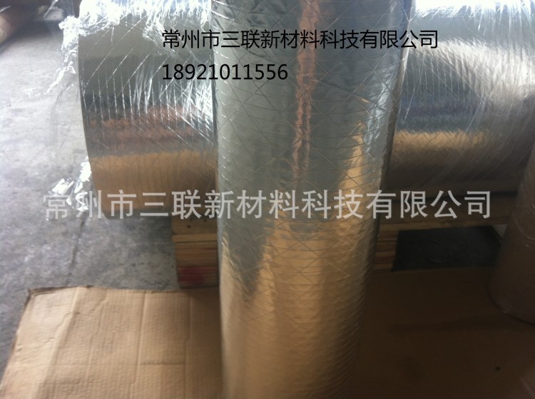 廠家直銷夾筋鋁箔復(fù)合牛皮紙膠帶制品夾筋纖維牛皮紙復(fù)合膠帶