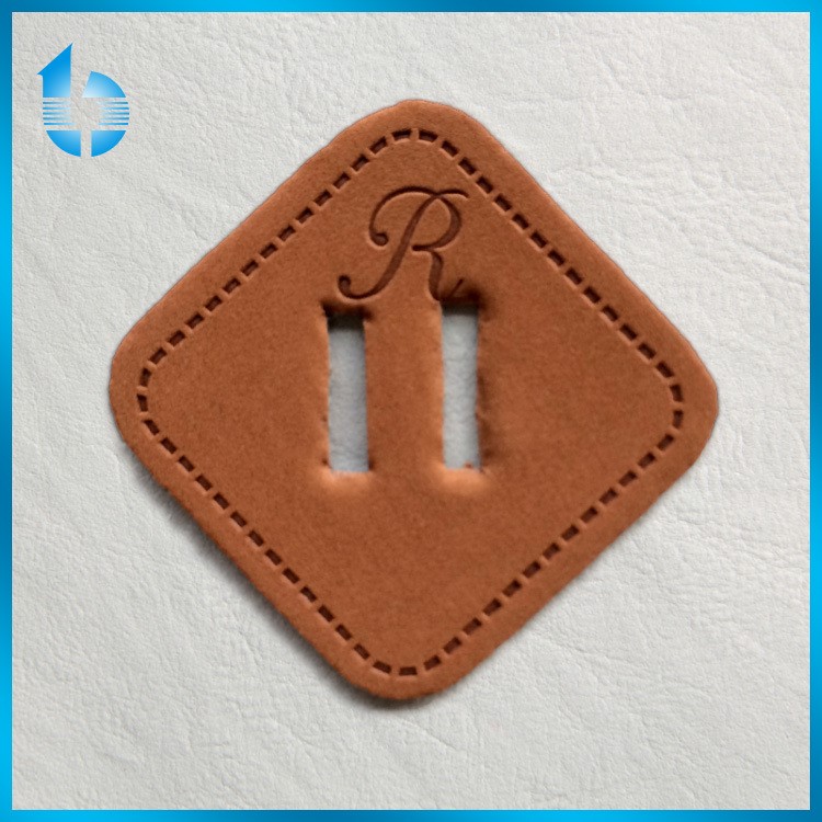 浙江皮標(biāo)廠 制作激光雕花皮標(biāo) 激光刻花皮牌  皮標(biāo) 皮牌 定做