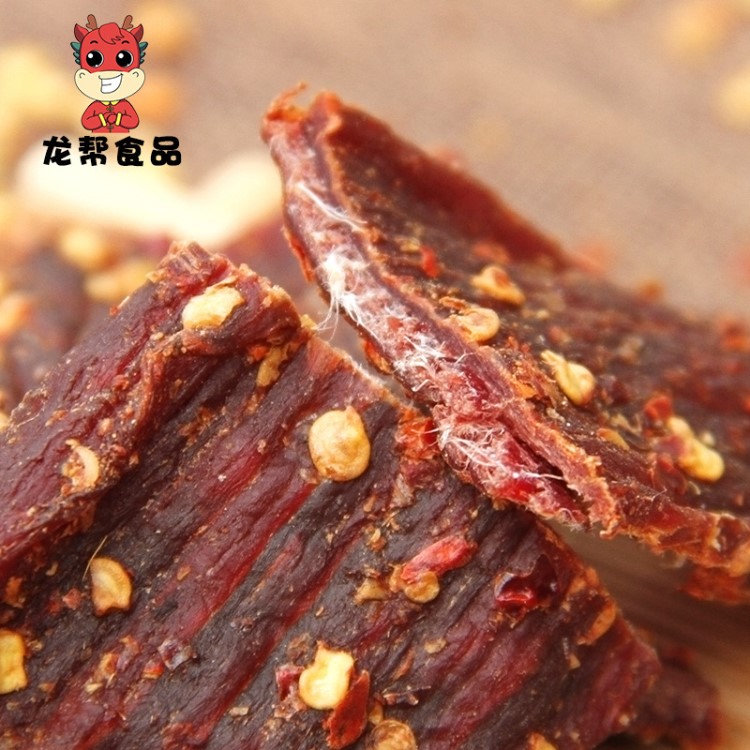 龍幫麻辣風(fēng)干牦牛肉手撕肉干五香青花椒麻辣零食批發(fā)小吃年貨現(xiàn)貨