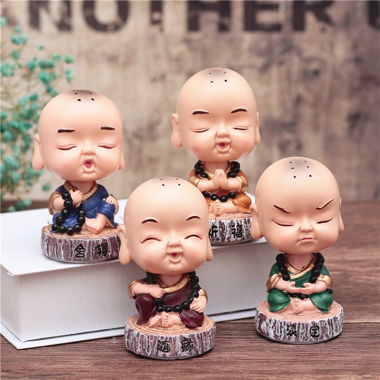 廠家批發(fā) 新款呆萌和尚搖頭娃娃陶瓷和尚個性創(chuàng)意家居汽車擺件