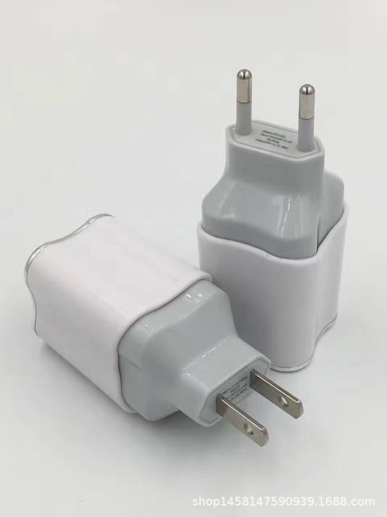 廠家直銷新款梅花充電器帶包裝 雙USB帶LED指示燈 5V2A手機(jī)充電器