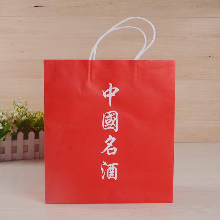 廠家供應(yīng)可定制logo活動手提服裝購物袋禮品酒類手提紙袋