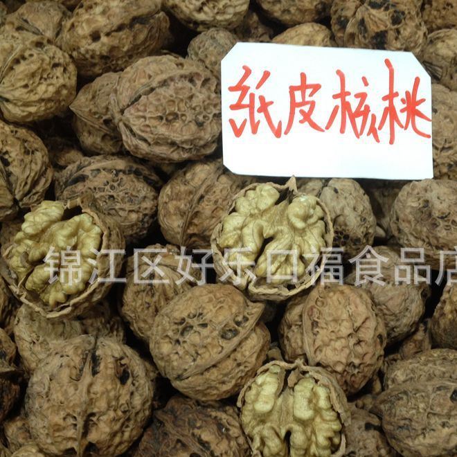 供應(yīng)特級云南紙皮核桃核桃仁手選精品堅果炒貨特產(chǎn)零食一件代發(fā)