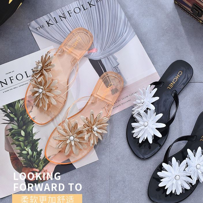 2017夏季新款時尚花朵人字拖鞋女歐美平跟防滑夾腳水晶沙灘鞋熱賣
