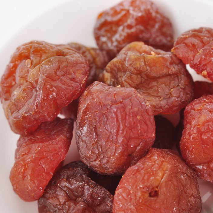 批发新疆特产 蜜饯果脯酸甜半边梅话梅 孕妇零食休闲食品情人梅子